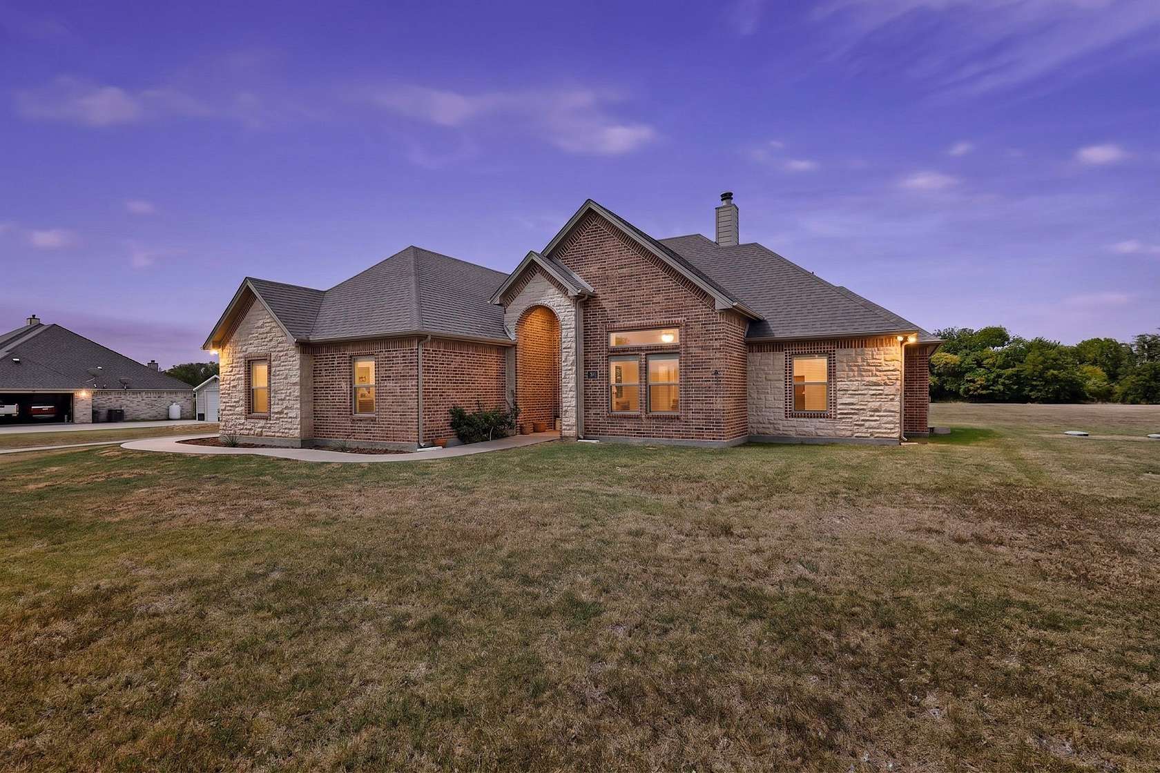 1.66 Acres of Land with Home for Sale in Grandview, Texas