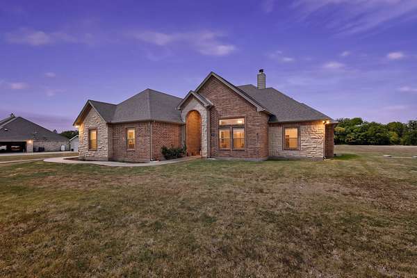 1.66 Acres of Land with Home for Sale in Grandview, Texas