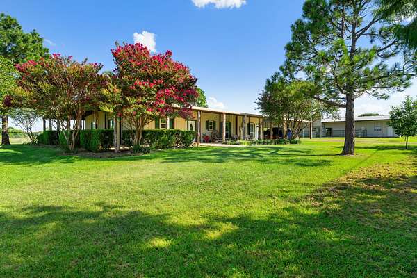 12.2 Acres of Land with Home for Sale in Terrell, Texas