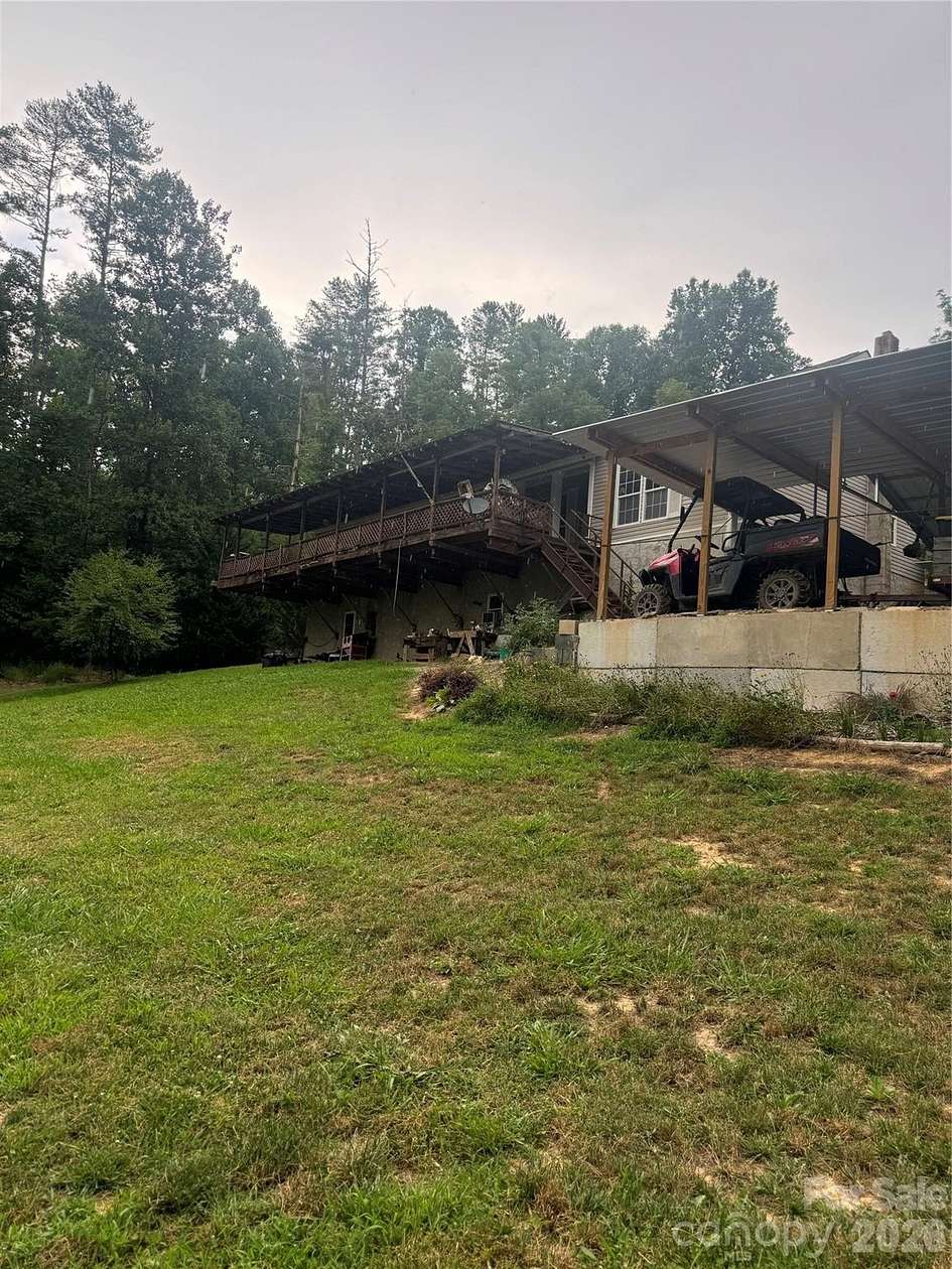 10.4 Acres of Land with Home for Sale in Marshall, North Carolina