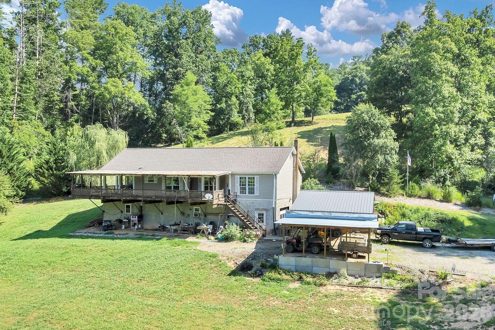 10.4 Acres of Land with Home for Sale in Marshall, North Carolina