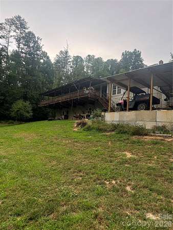 10.4 Acres of Land with Home for Sale in Marshall, North Carolina