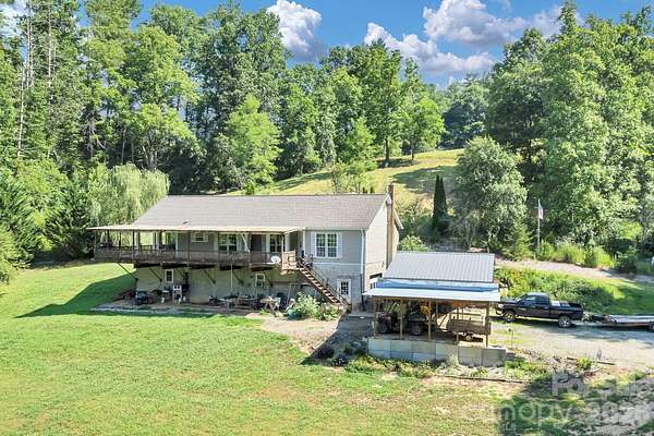 10.4 Acres of Land with Home for Sale in Marshall, North Carolina