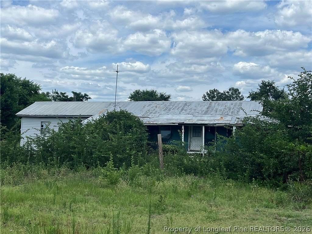1.5 Acres of Land with Home for Sale in Hope Mills, North Carolina