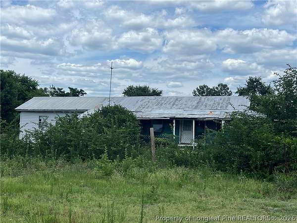 1.5 Acres of Land with Home for Sale in Hope Mills, North Carolina