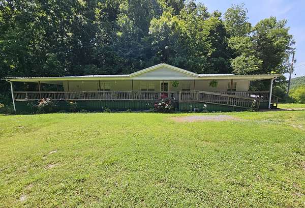 9.5 Acres of Land with Home for Sale in Whitleyville, Tennessee