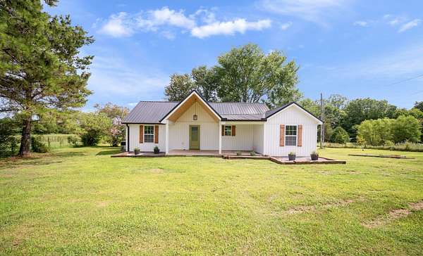 5 Acres of Land with Home for Sale in Charlotte, Tennessee