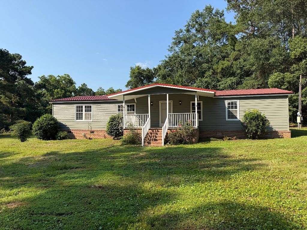7.63 Acres of Land with Home for Sale in Cairo, Georgia