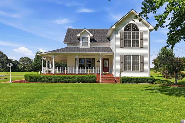 1.5 Acres of Land with Home for Sale in Almo, Kentucky