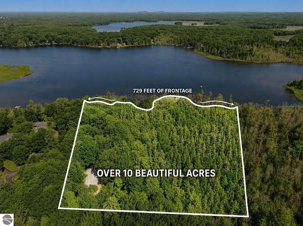 10.6 Acres of Land with Home for Sale in Interlochen, Michigan