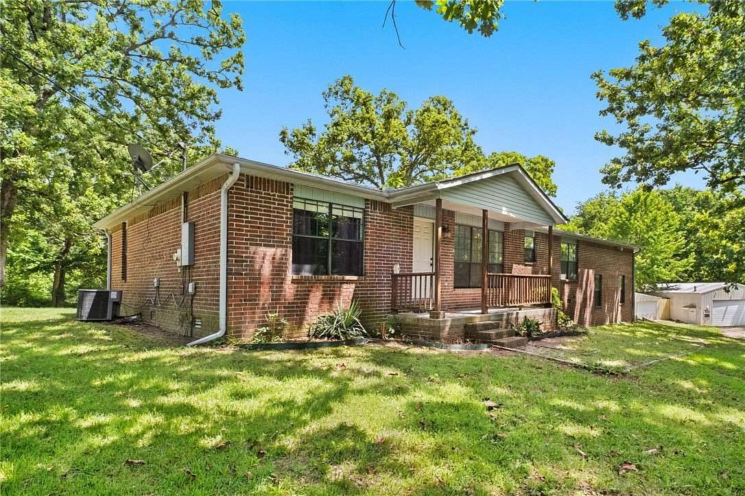4.7 Acres of Land with Home for Sale in Garfield, Arkansas