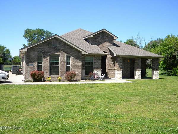 8.25 Acres of Land with Home for Sale in Carthage, Missouri
