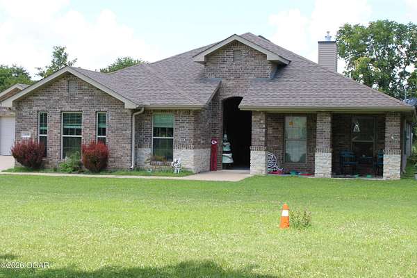 8.25 Acres of Land with Home for Sale in Carthage, Missouri