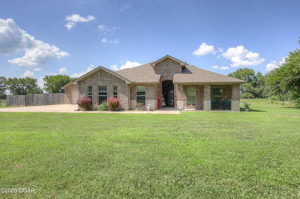 8.25 Acres of Land with Home for Sale in Carthage, Missouri