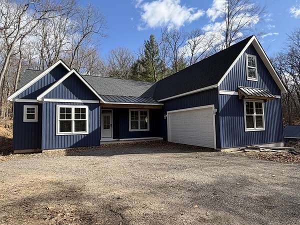 2 Acres of Land with Home for Sale in Grant, Michigan