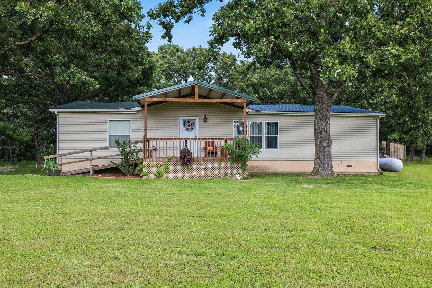 10 Acres of Land with Home for Sale in Tunas, Missouri