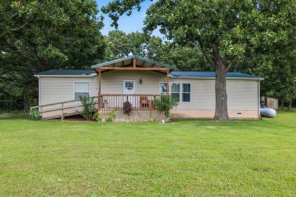 10 Acres of Land with Home for Sale in Tunas, Missouri