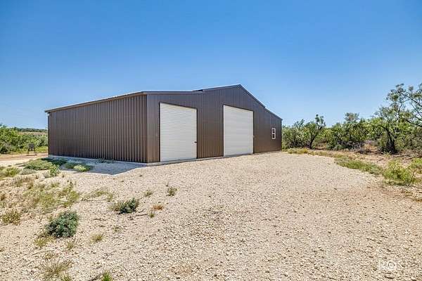 12.2 Acres of Recreational Land with Home for Sale in Paint Rock, Texas