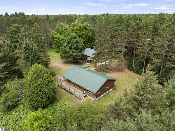 8.64 Acres of Land with Home for Sale in Interlochen, Michigan