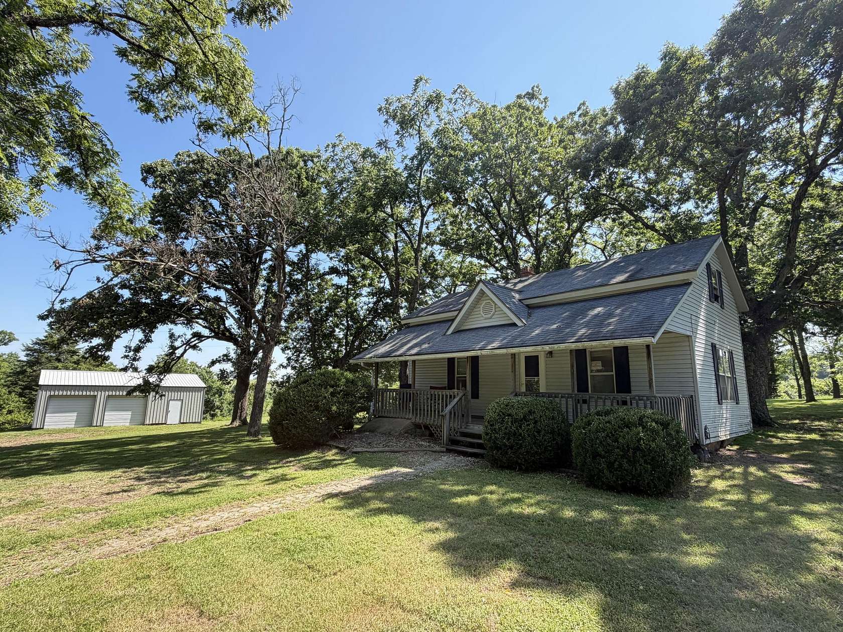 5.5 Acres of Land with Home for Sale in Hartville, Missouri