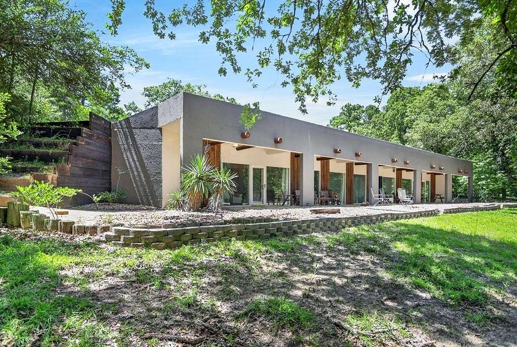 24.9 Acres of Recreational Land with Home for Sale in Grapeland, Texas