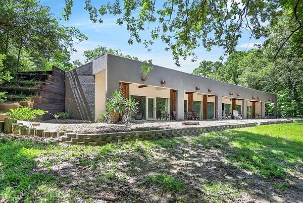 24.9 Acres of Recreational Land with Home for Sale in Grapeland, Texas