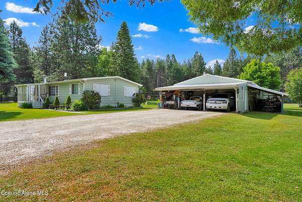 5.28 Acres of Land with Home for Sale in Sagle, Idaho