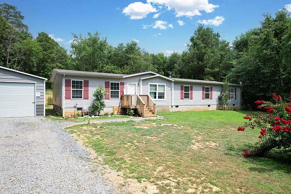 5.22 Acres of Land with Home for Sale in Benton, Tennessee
