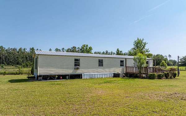 5 Acres of Land with Home for Sale in Live Oak, Florida