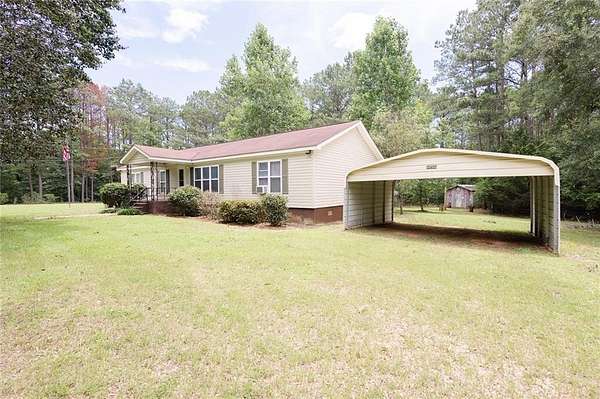 10.1 Acres of Land with Home for Sale in Valley, Alabama