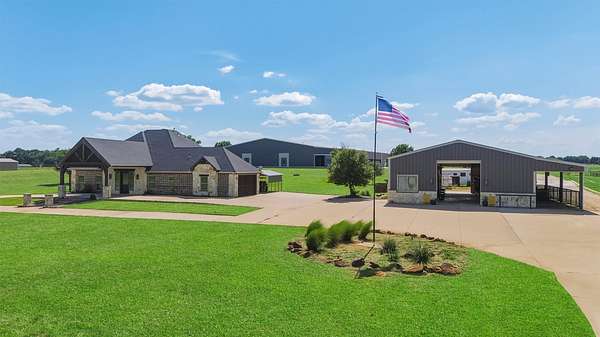 23 Acres of Agricultural Land with Home for Sale in Pilot Point, Texas