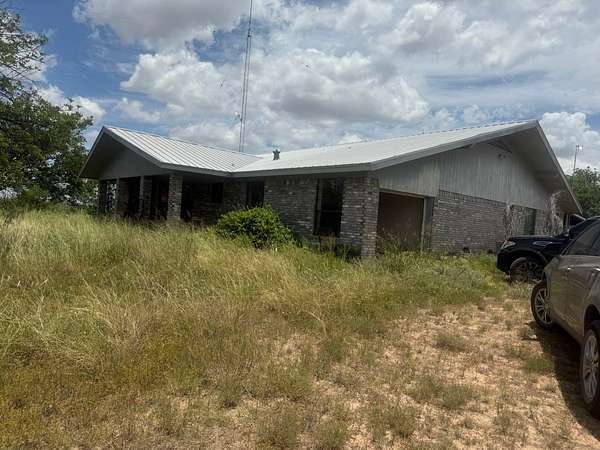 9.74 Acres of Land with Home for Sale in Ballinger, Texas
