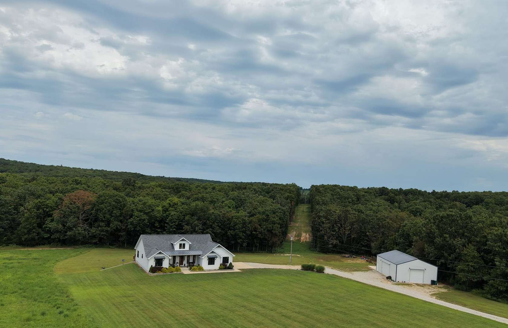 38.4 Acres of Recreational Land with Home for Sale in Mountain View, Missouri
