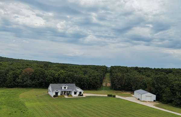 38.4 Acres of Recreational Land with Home for Sale in Mountain View, Missouri