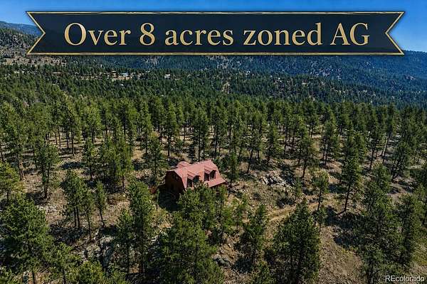 8.64 Acres of Land with Home for Sale in Bailey, Colorado