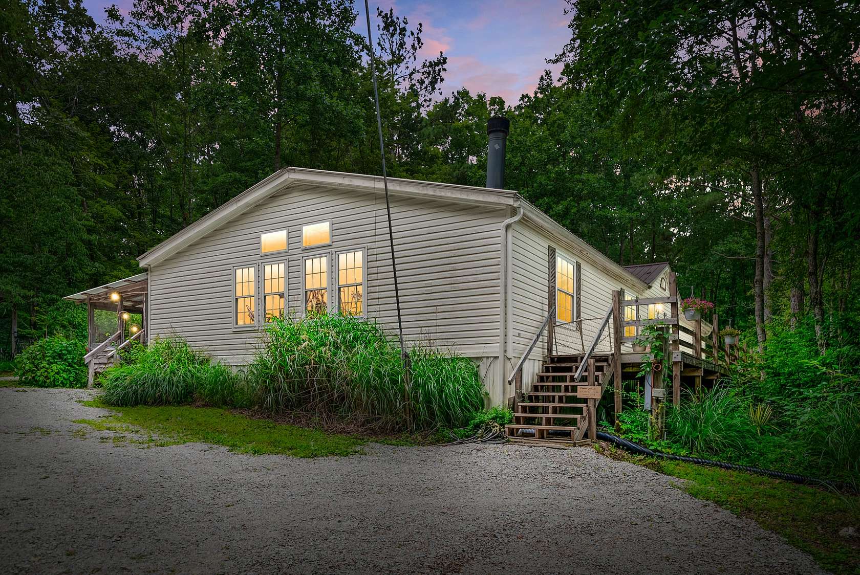 5.12 Acres of Land with Home for Sale in Hohenwald, Tennessee
