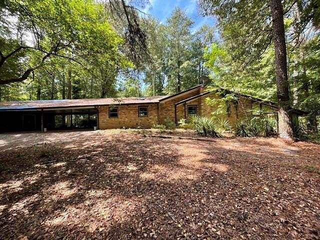 9.36 Acres of Land with Home for Sale in Stone Mountain, Georgia