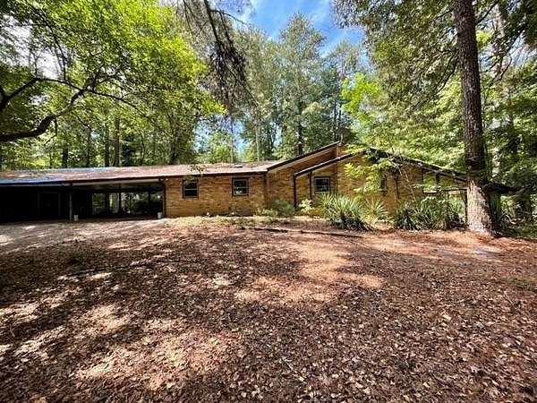 9.36 Acres of Land with Home for Sale in Stone Mountain, Georgia