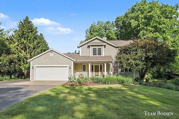 2.13 Acres of Land with Home for Sale in Rockford, Michigan