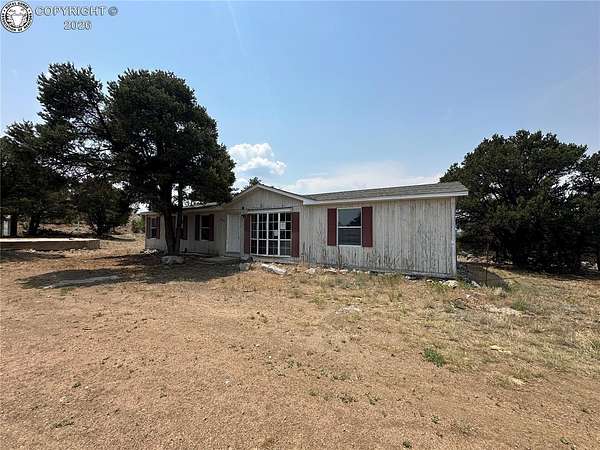 6.4 Acres of Land with Home for Sale in Cotopaxi, Colorado