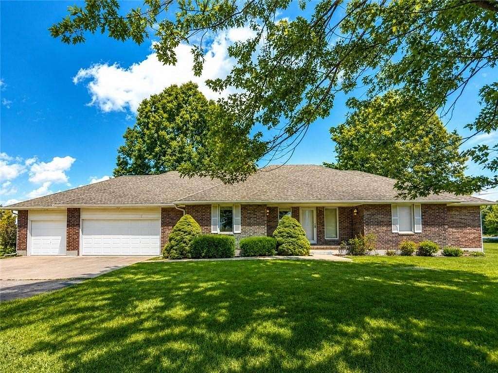 10 Acres of Recreational Land with Home for Sale in Belton, Missouri