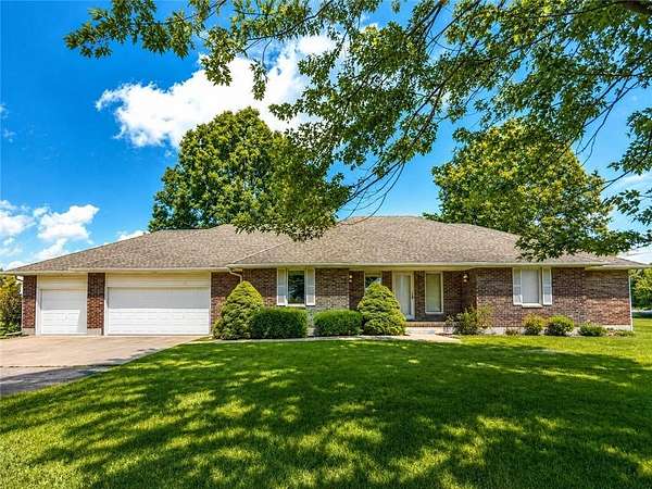 10 Acres of Recreational Land with Home for Sale in Belton, Missouri