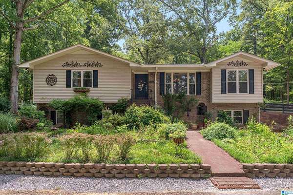 4.88 Acres of Land with Home for Sale in Leeds, Alabama