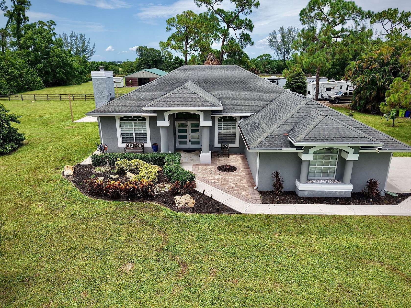 5 Acres of Land with Home for Sale in Loxahatchee Groves, Florida