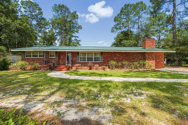 1.5 Acres of Land with Home for Sale in Pell City, Alabama