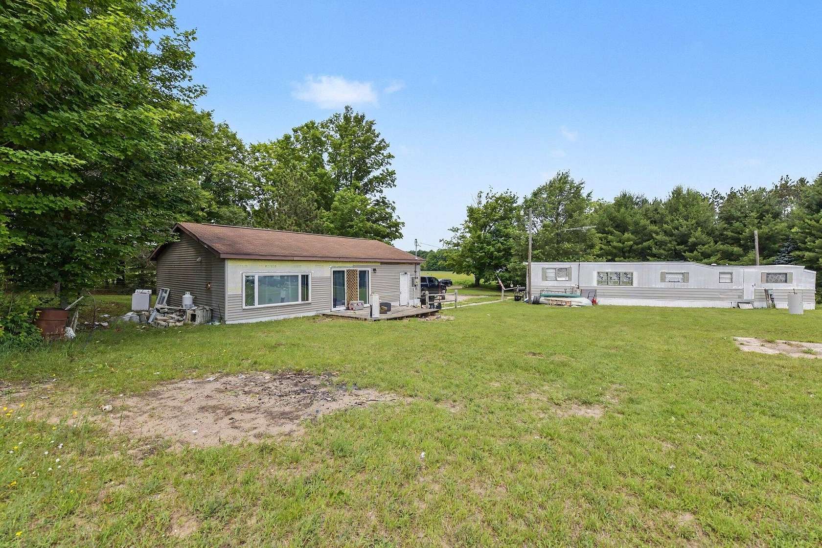10 Acres of Land with Home for Sale in Rapid City, Michigan