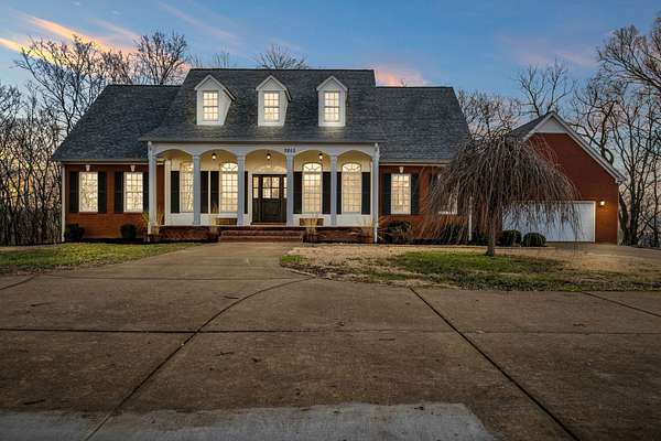5 Acres of Land with Home for Sale in Santa Fe, Tennessee