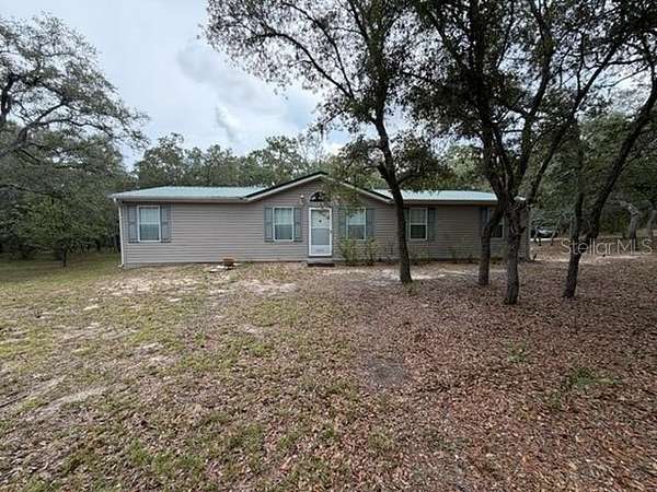 5 Acres of Land with Home for Sale in Homosassa, Florida