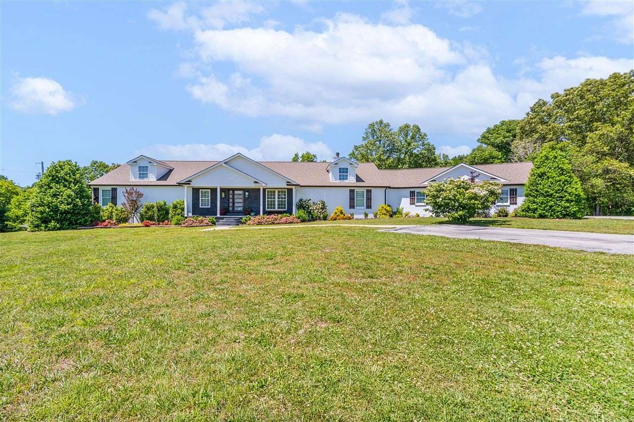 7.83 Acres of Land with Home for Sale in Scottsville, Kentucky
