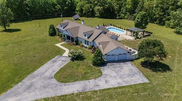 7.83 Acres of Land with Home for Sale in Scottsville, Kentucky